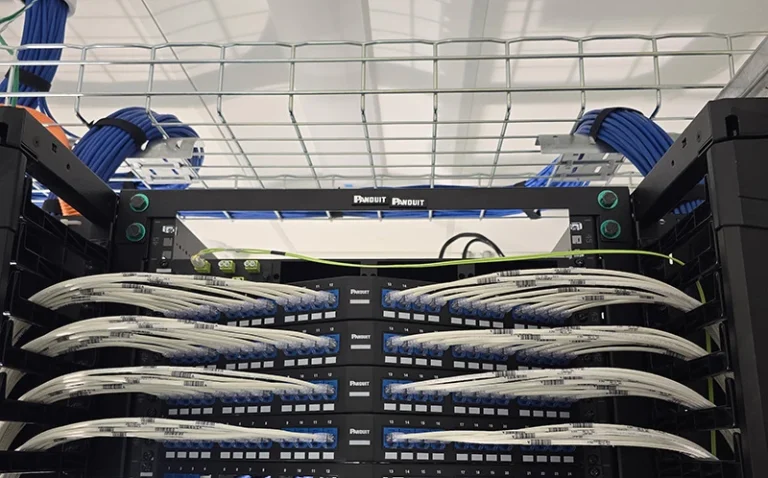 Patch panels and structured cabling in an office rack in Toronto