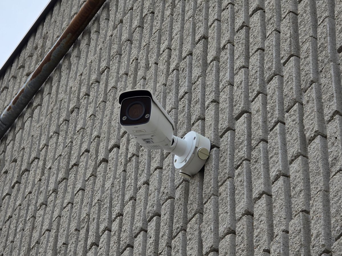 Bullet security camera on an exterior block wall
